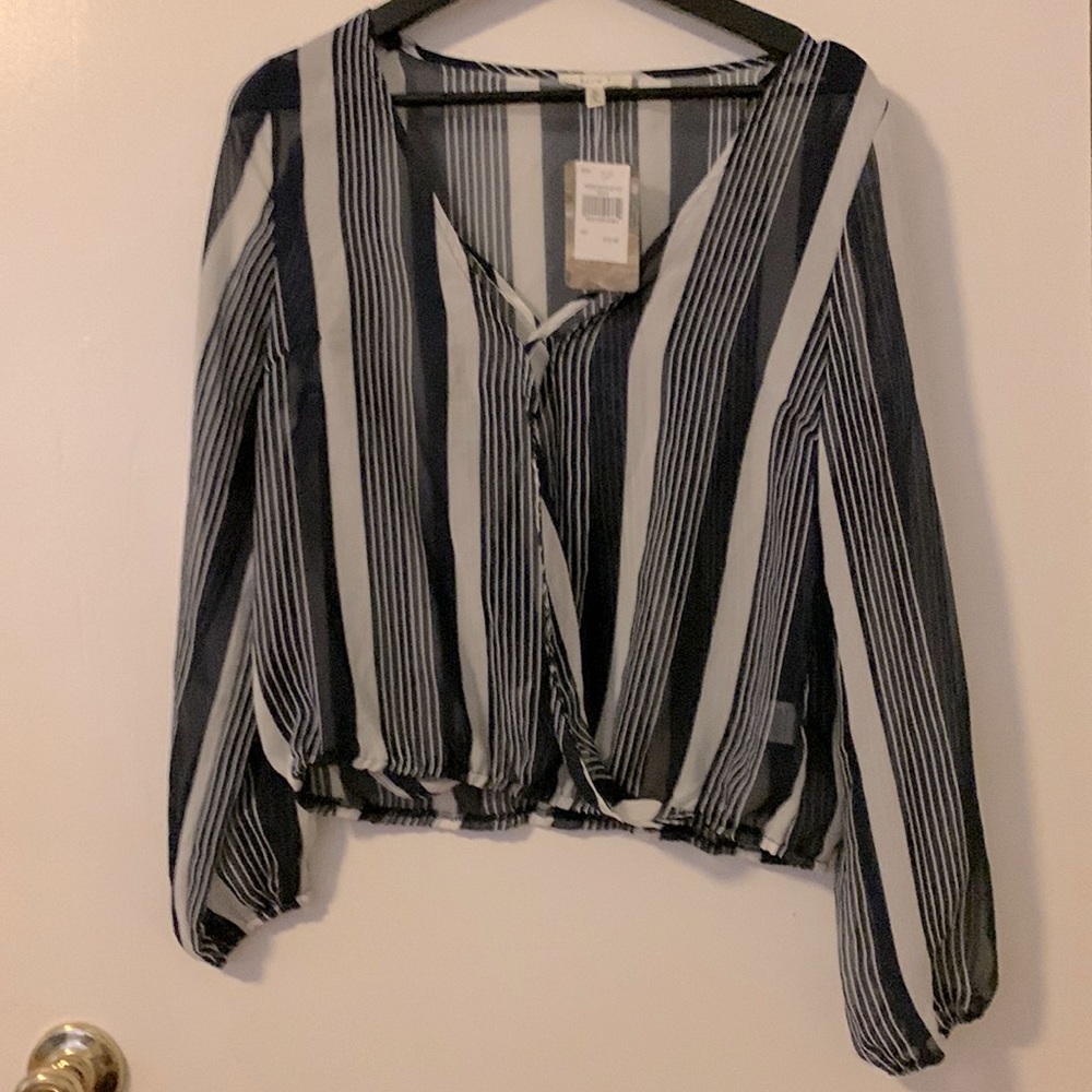 Lue and white striped woman’s blouse